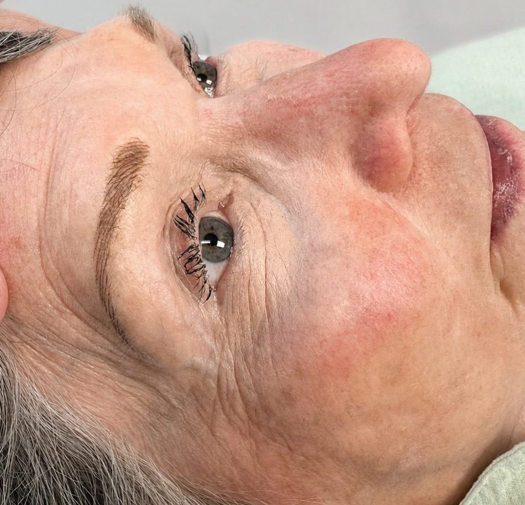 Natural nano brow results on a mature client with realistic hair strokes and softly enhanced eyebrows in the Salt Lake City area.